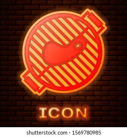 Glowing neon Barbecue grill with steak icon isolated on brick wall background. BBQ grill party.  Vector Illustration