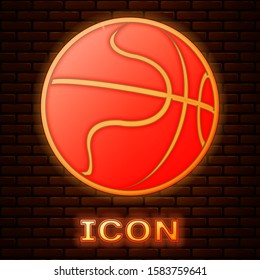 Glowing neon Basketball ball icon isolated on brick wall background. Sport symbol.  Vector Illustration