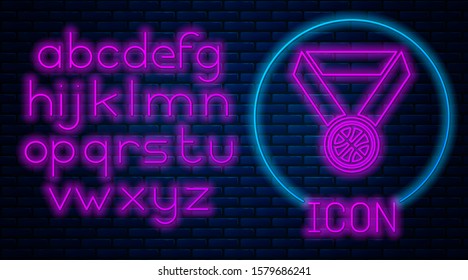 Glowing neon Basketball medal with ribbon icon isolated on brick wall background. Neon light alphabet. Vector Illustration