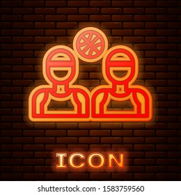 Glowing neon Basketball players icon isolated on brick wall background.  Vector Illustration