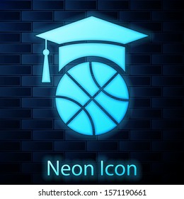 Glowing neon Basketball training icon isolated on brick wall background.  Vector Illustration
