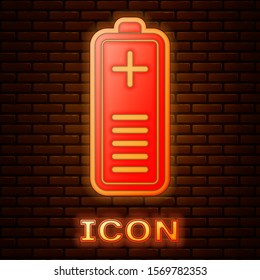 Glowing neon Battery charge level indicator icon isolated on brick wall background.  Vector Illustration
