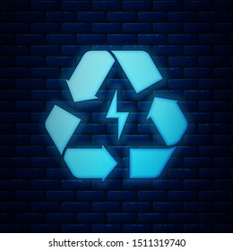 Glowing neon Battery with recycle symbol line icon isolated on brick wall background. Battery with recycling symbol - renewable energy concept.  Vector Illustration