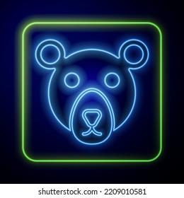 Icono de la cabeza del oso de neón brillante aislado en fondo azul.  Vector