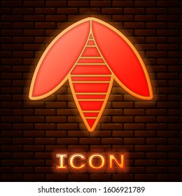 Glowing neon Bee icon isolated on brick wall background. Sweet natural food. Honeybee or apis with wings symbol. Flying insect.  Vector Illustration