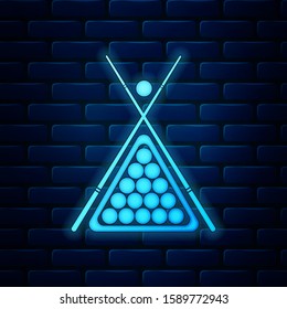 Glowing neon Billiard cue and balls in a rack triangle icon isolated on brick wall background.  Vector Illustration