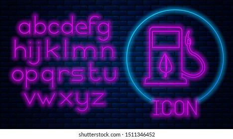 Glowing neon Bio fuel concept with fueling nozzle and leaf icon isolated on brick wall background. Gas station with leaves. Eco refueling. Neon light alphabet. Vector Illustration