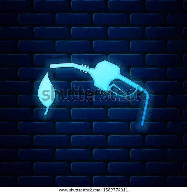 Glowing neon Bio fuel concept
with fueling nozzle and leaf icon isolated on brick wall
background. Natural energy concept. Gas station gun sign.  Vector
Illustration
