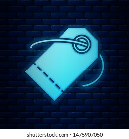 Glowing neon Blank label template price tag icon isolated on brick wall background. Empty shopping discount sticker. Template discount banner.  Vector Illustration