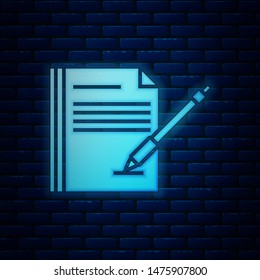 Glowing neon Blank notebook and pen icon isolated on brick wall background. Paper and pen.  Vector Illustration