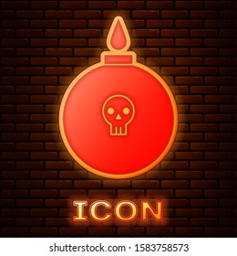 Glowing neon Bomb ready to explode icon isolated on brick wall background.  Vector Illustration