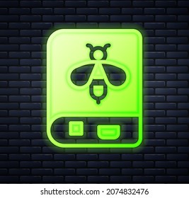 Glowing neon Book about bee icon isolated on brick wall background. Sweet natural food. Honeybee or apis with wings symbol. Flying insect.  Vector