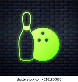 Glowing neon Bowling pin and ball icon isolated on brick wall background. Sport equipment.  Vector