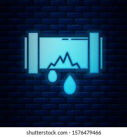 Glowing neon Broken metal pipe with leaking water icon isolated on brick wall background.  Vector Illustration