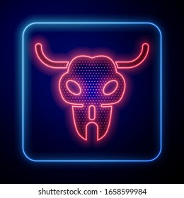 Glowing neon Buffalo skull icon isolated on blue background.  Vector Illustration