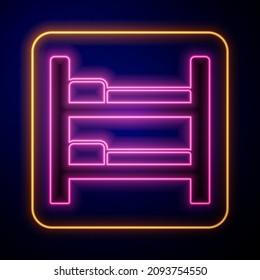 Glowing neon Bunk bed icon isolated on black background.  Vector