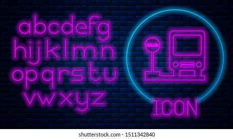 Glowing neon Bus stop icon isolated on brick wall background. Transportation concept. Bus tour transport sign. Tourism or public vehicle symbol. Neon light alphabet. Vector Illustration