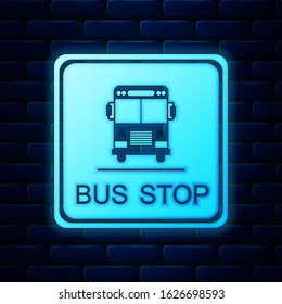 Glowing neon Bus stop icon isolated on brick wall background.  Vector Illustration