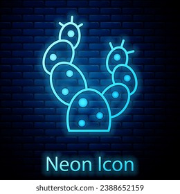 Glowing neon Cactus icon isolated on brick wall background.  Vector