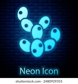 Glowing neon Cactus icon isolated on brick wall background.  Vector