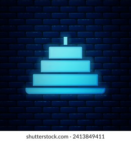 Glowing neon Cake with burning candles icon isolated on brick wall background. Happy Birthday.  Vector