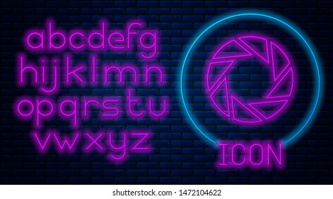 Glowing neon Camera shutter icon isolated on brick wall background. Neon light alphabet. Vector Illustration