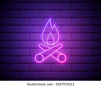 Glowing neon Campfire icon isolated on brick wall background. Burning bonfire with wood. Vector Illustration.