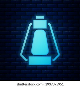 Glowing neon Camping lantern icon isolated on brick wall background. Happy Halloween party.  Vector