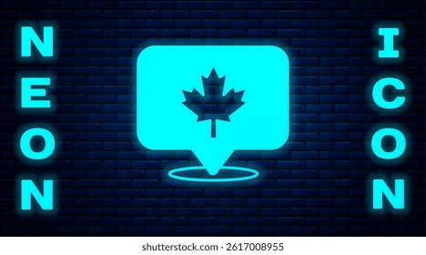 Glowing neon Canadian maple leaf icon isolated on brick wall background. Canada symbol maple leaf.  Vector