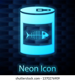 Glowing neon Canned food for cat icon isolated on brick wall background. Fish skeleton sign. Food for animals. Pet dog food can. Vector Illustration