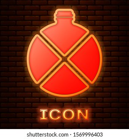 Glowing neon Canteen water bottle icon isolated on brick wall background. Tourist flask icon. Jar of water use in the campaign.  Vector Illustration