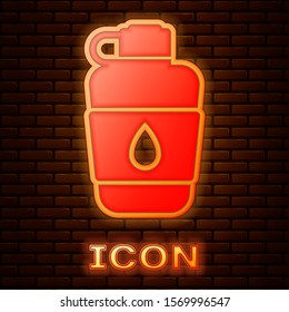 Glowing neon Canteen water bottle icon isolated on brick wall background. Tourist flask icon. Jar of water use in the campaign.  Vector Illustration