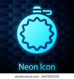 Glowing neon Canteen water bottle icon isolated on brick wall background. Tourist flask icon. Jar of water use in the campaign.  Vector
