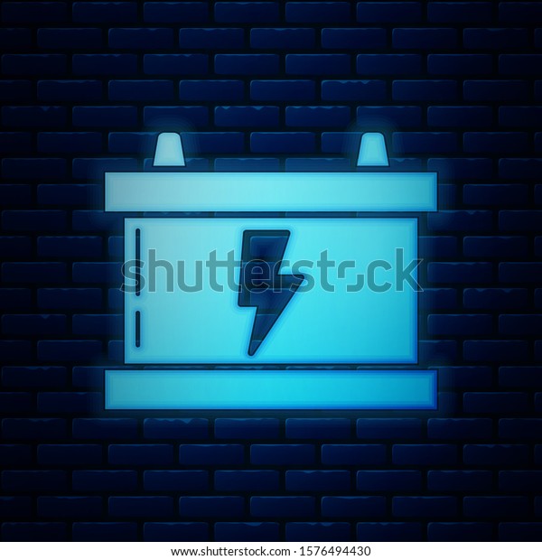 Glowing\
neon Car battery icon isolated on brick wall background.\
Accumulator battery energy power and electricity accumulator\
battery. Lightning bolt.  Vector\
Illustration