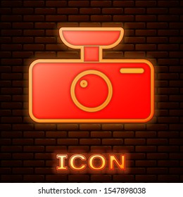 Glowing neon Car DVR icon isolated on brick wall background. Car digital video recorder icon.  Vector Illustration