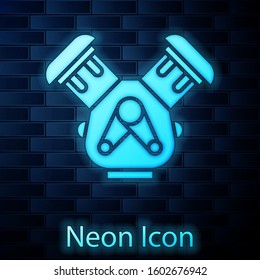 Glowing neon Car engine icon isolated on brick wall background.  Vector Illustration