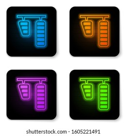 Glowing neon Car gas and brake pedals icon isolated on white background. Black square button. Vector Illustration