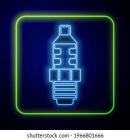 Glowing neon Car spark plug icon isolated on blue background. Car electric candle.  Vector