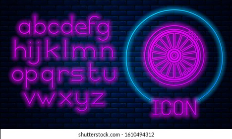 Glowing neon Car wheel icon isolated on brick wall background. Neon light alphabet. Vector Illustration