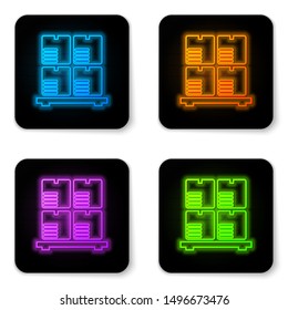Glowing neon Cardboard boxes on pallet icon isolated on white background. Closed carton delivery packaging box with fragile signs. Black square button. Vector Illustration