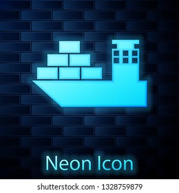 Glowing neon Cargo ship icon isolated on brick wall background. Vector Illustration