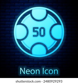 Glowing neon Casino chips icon isolated on brick wall background. Casino gambling.  Vector