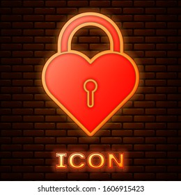 Glowing neon Castle in the shape of a heart icon isolated on brick wall background. Locked Heart. Love symbol and keyhole sign.  Vector Illustration