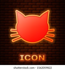 Glowing neon Cat icon isolated on brick wall background.  Vector Illustration