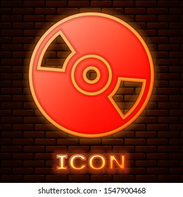 Glowing neon CD or DVD disk icon isolated on brick wall background. Compact disc sign.  Vector Illustration