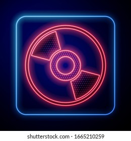 Glowing neon CD or DVD disk icon isolated on blue background. Compact disc sign.  Vector Illustration