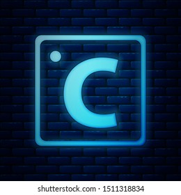 Glowing neon Celsius icon isolated on brick wall background.  Vector Illustration