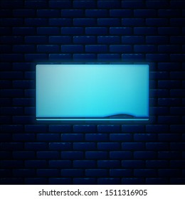 Glowing neon Chalkboard icon isolated on brick wall background. School Blackboard sign.  Vector Illustration