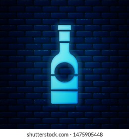 Glowing neon Champagne bottle icon isolated on brick wall background.  Vector Illustration