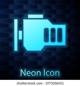Glowing neon Check engine icon isolated on brick wall background.  Vector